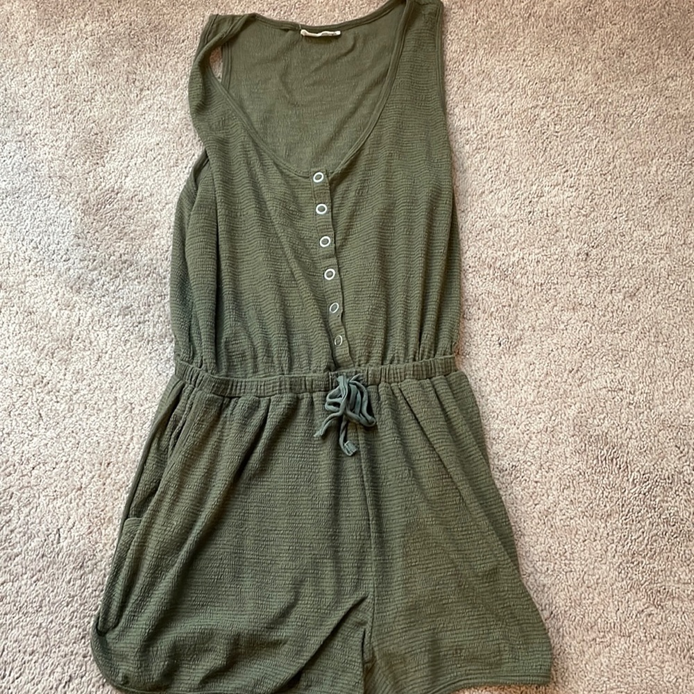 Small, green romper